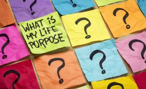 Image of post it notes with question marks and says "what is my life purpose"