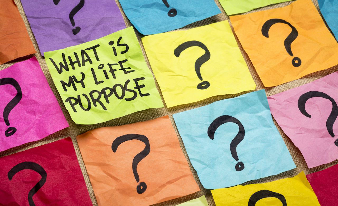 Image of post it notes with question marks and says "what is my life purpose"